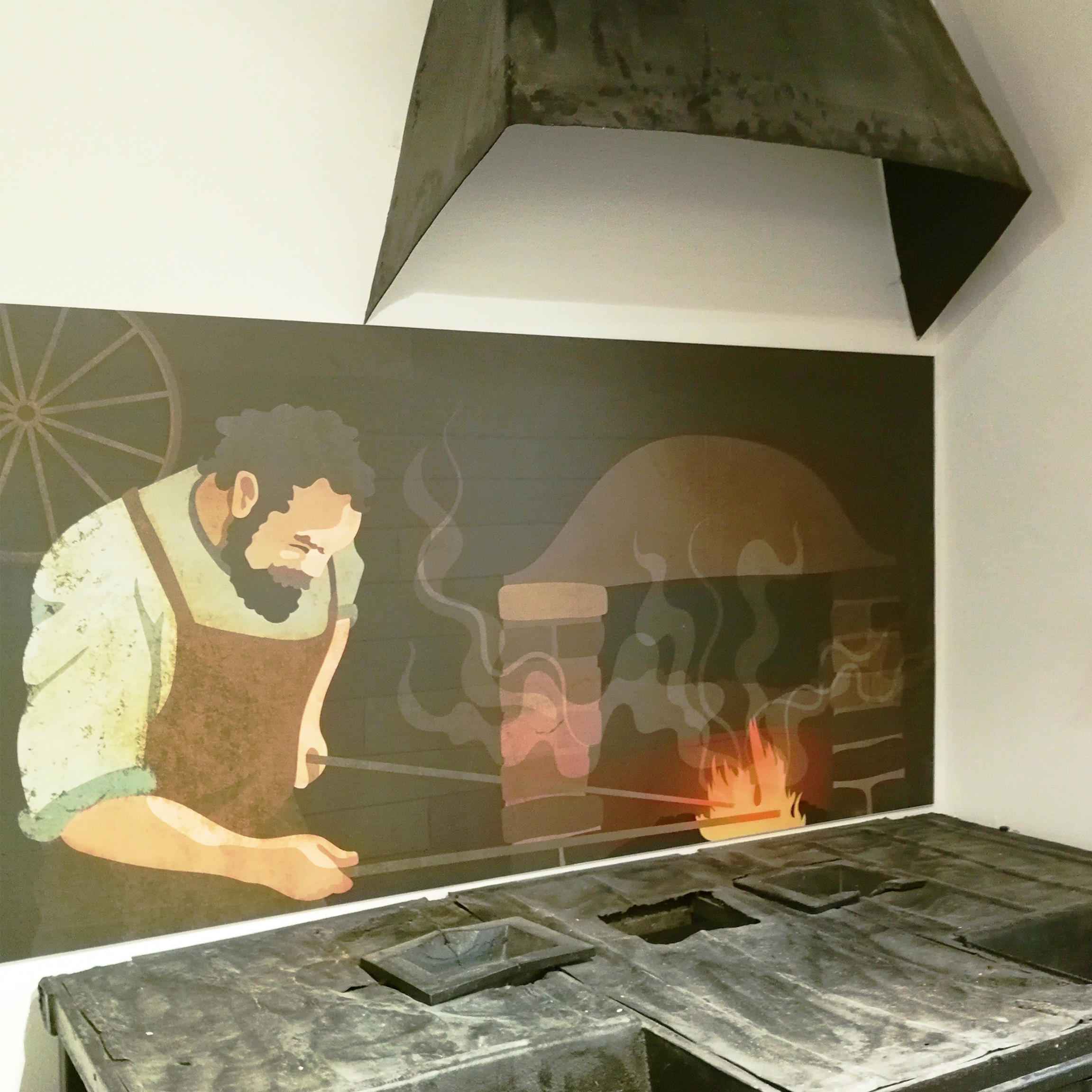 Kovácsműhely dolgozó mesterrel